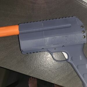 Gray and Orange Toy Blaster